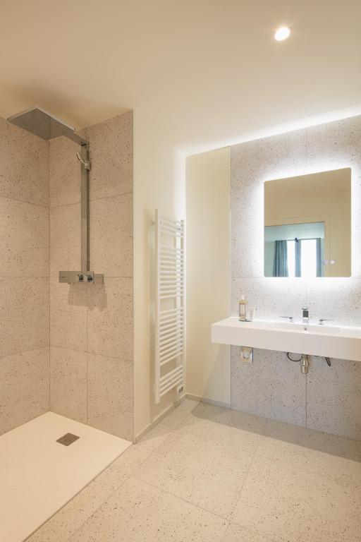Koupelna v ubytování Hôtel La Suite