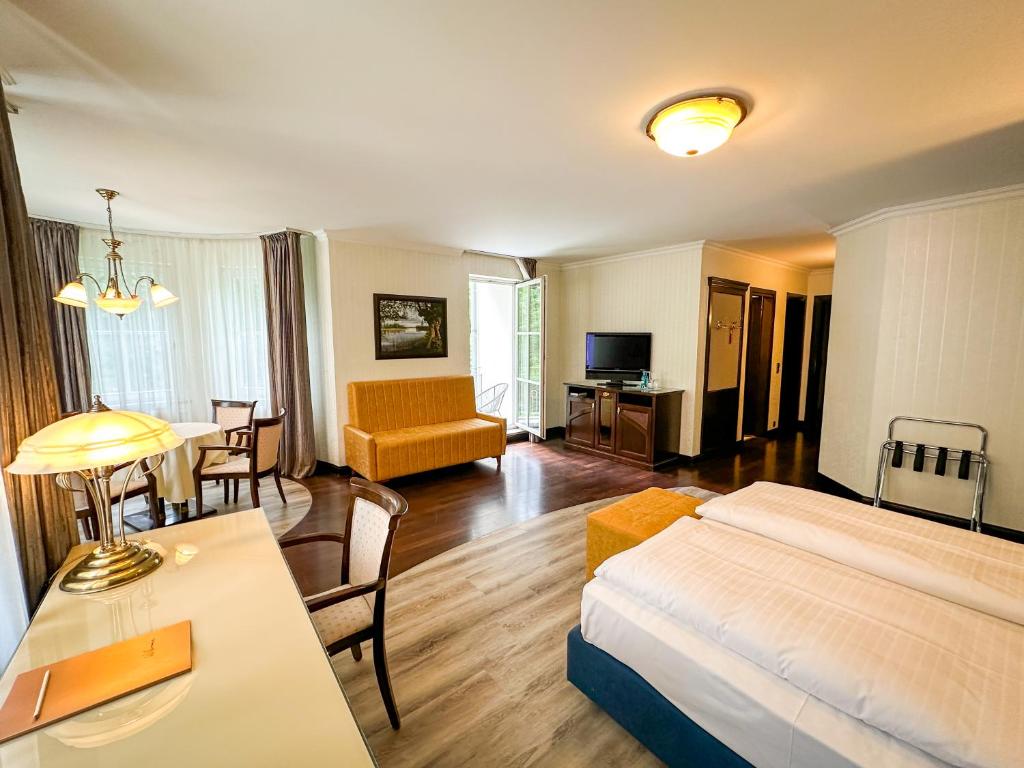 Postel nebo postele na pokoji v ubytování Weltemühle Hotel by Miri's Dresden
