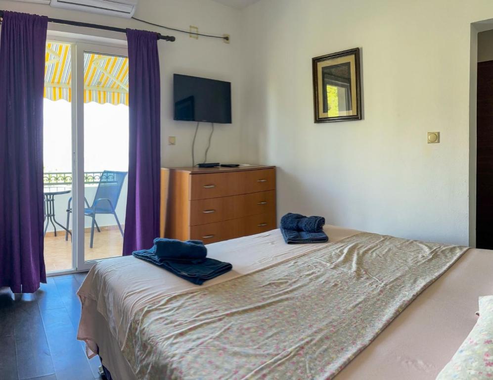 Postel nebo postele na pokoji v ubytování Villa Dulsinea