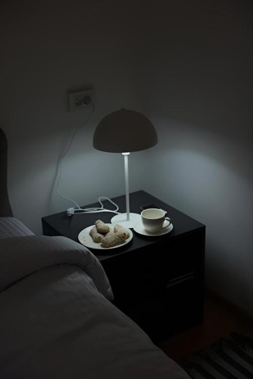 Postel nebo postele na pokoji v ubytování Twins Guest House
