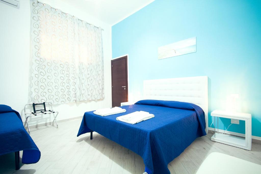 Postel nebo postele na pokoji v ubytování B&B A Mare