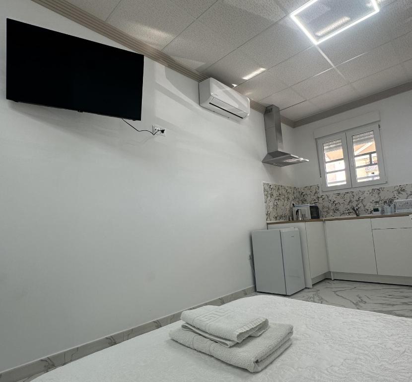 A kitchen or kitchenette at Hotel Avenida