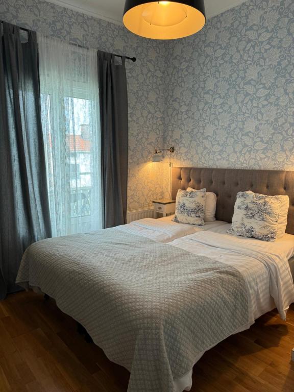 Voodi või voodid majutusasutuse Nautic Hotell toas