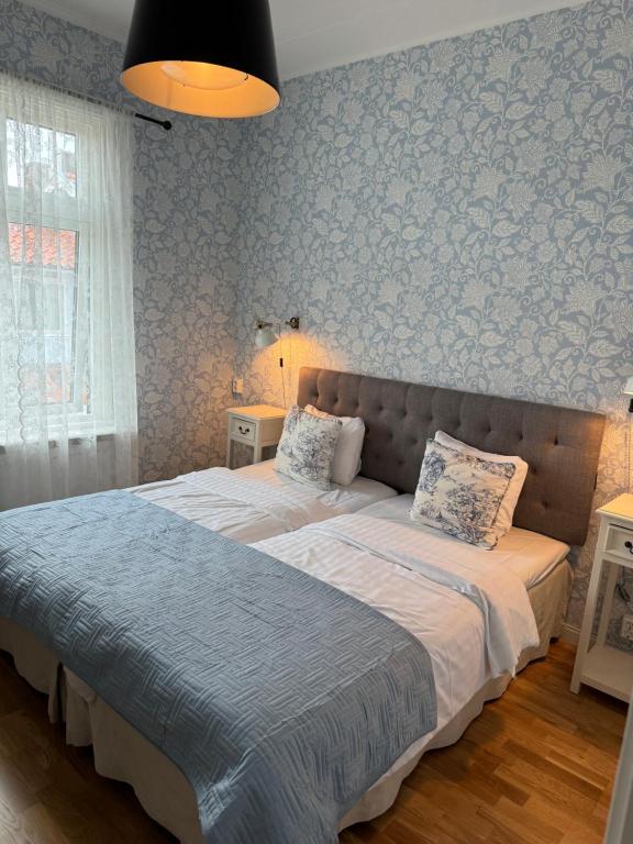 Voodi või voodid majutusasutuse Nautic Hotell toas