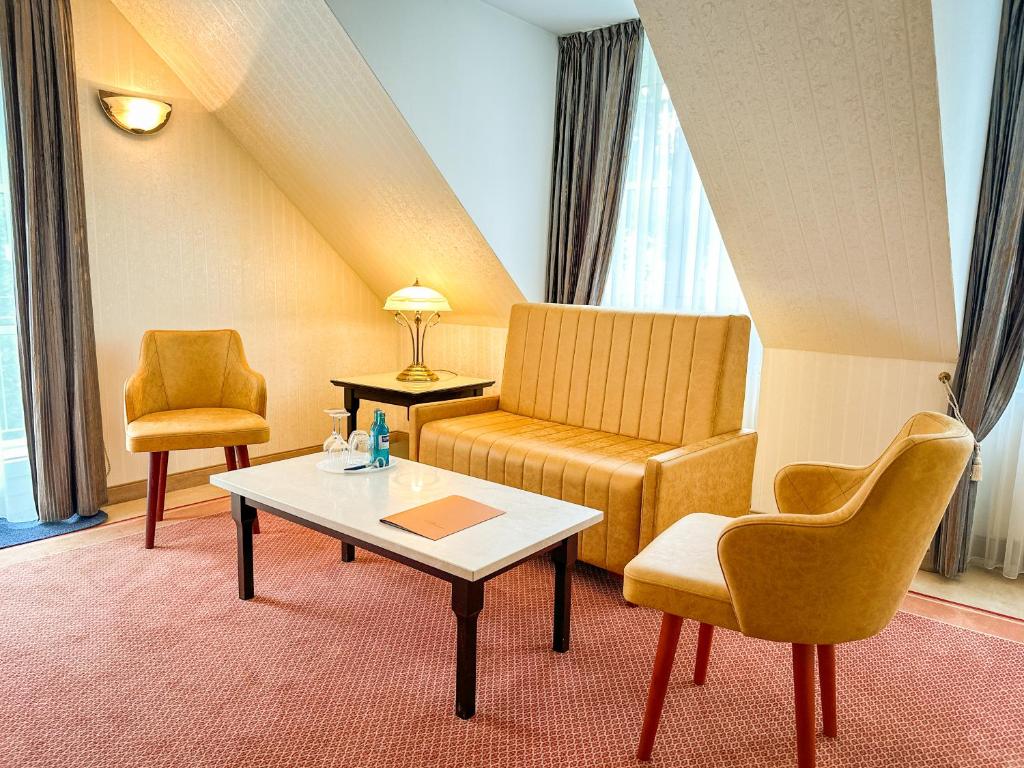 Posezení v ubytování Weltemühle Hotel by Miri's Dresden