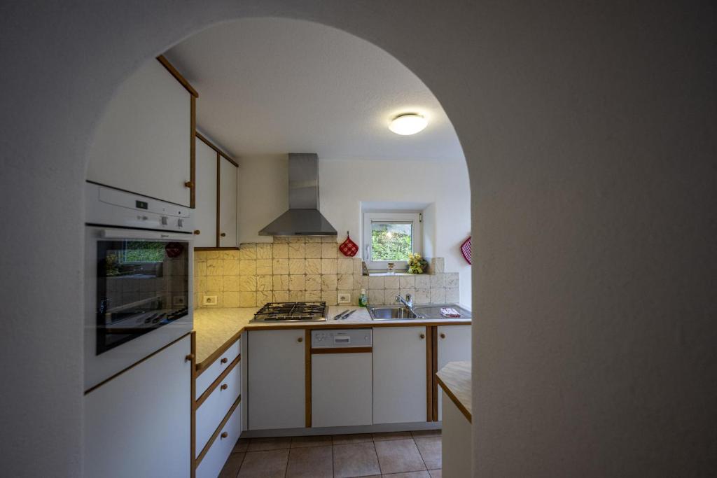 A kitchen or kitchenette at Apartments Smidl