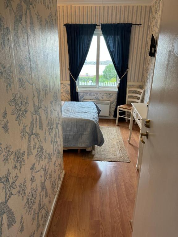 Voodi või voodid majutusasutuse Nautic Hotell toas