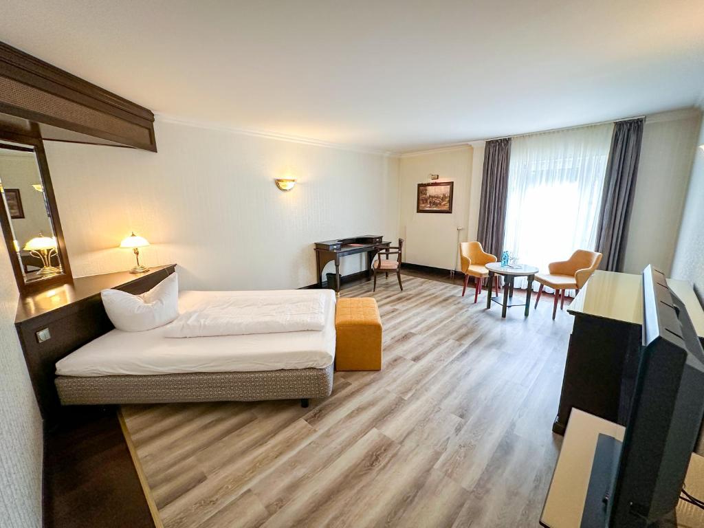 Postel nebo postele na pokoji v ubytování Weltemühle Hotel by Miri's Dresden