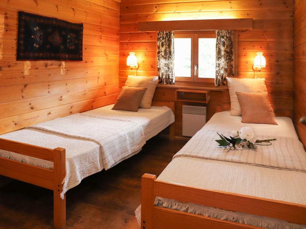 Postel nebo postele na pokoji v ubytování Chalet Château Lapin by Interhome