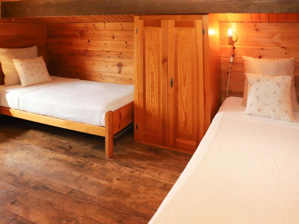 Postel nebo postele na pokoji v ubytování Chalet Château Lapin by Interhome
