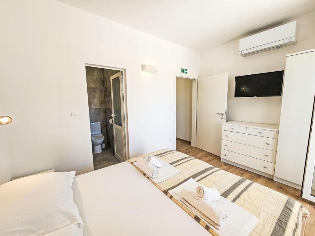 Posteľ alebo postele v izbe v ubytovaní Apartment Balota - Moreška-1 by Interhome