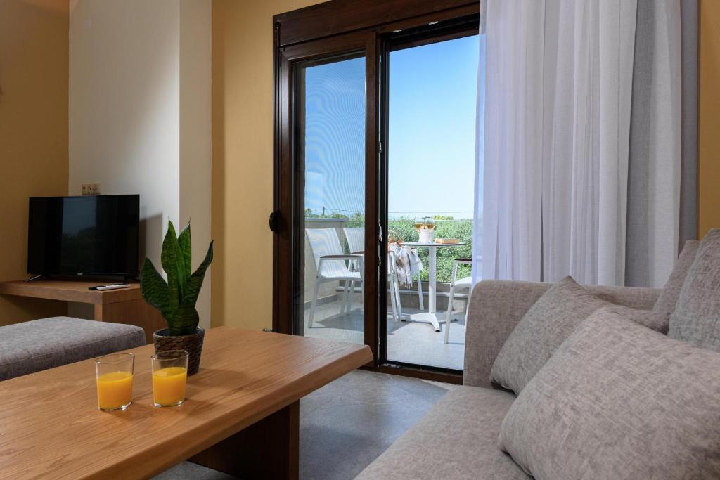 TV a/nebo společenská místnost v ubytování Olea Luxury Villa