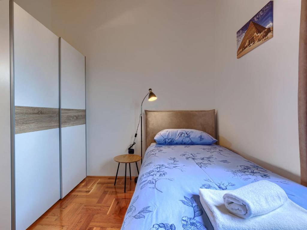 Posteľ alebo postele v izbe v ubytovaní Holiday Home Starci by Interhome