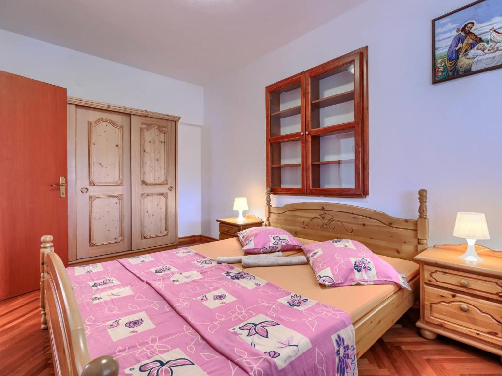 Postel nebo postele na pokoji v ubytování Holiday Home Edi by Interhome