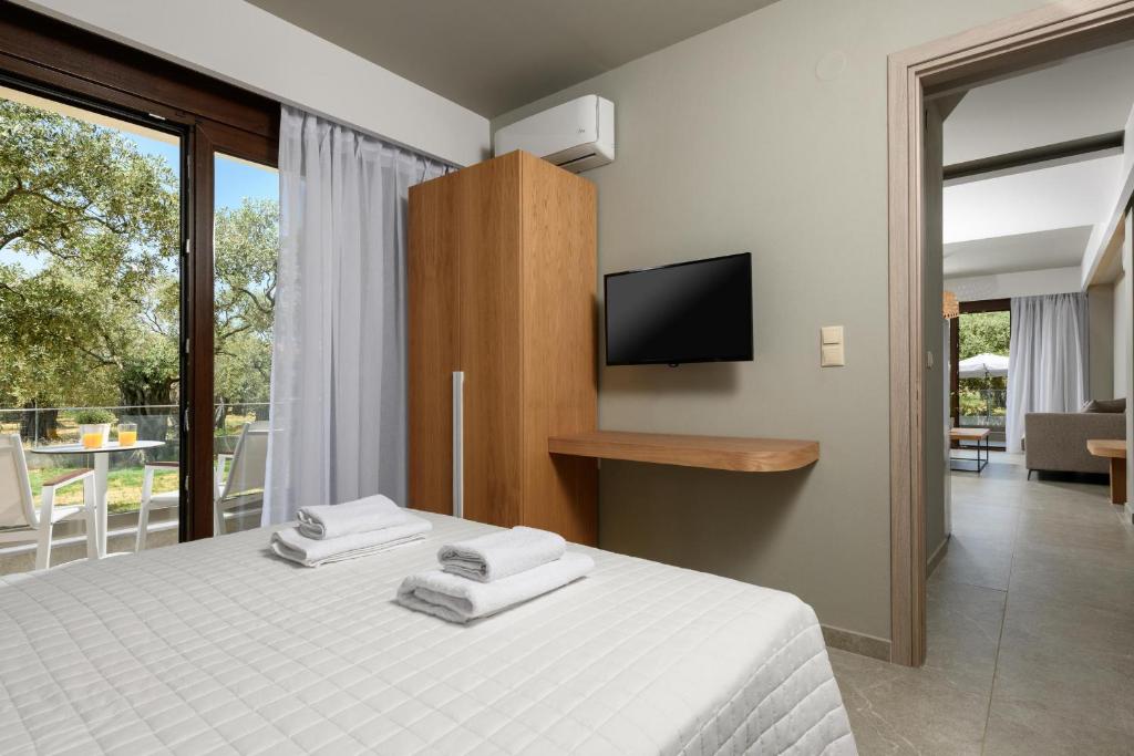 TV a/nebo společenská místnost v ubytování Olea Luxury Villa