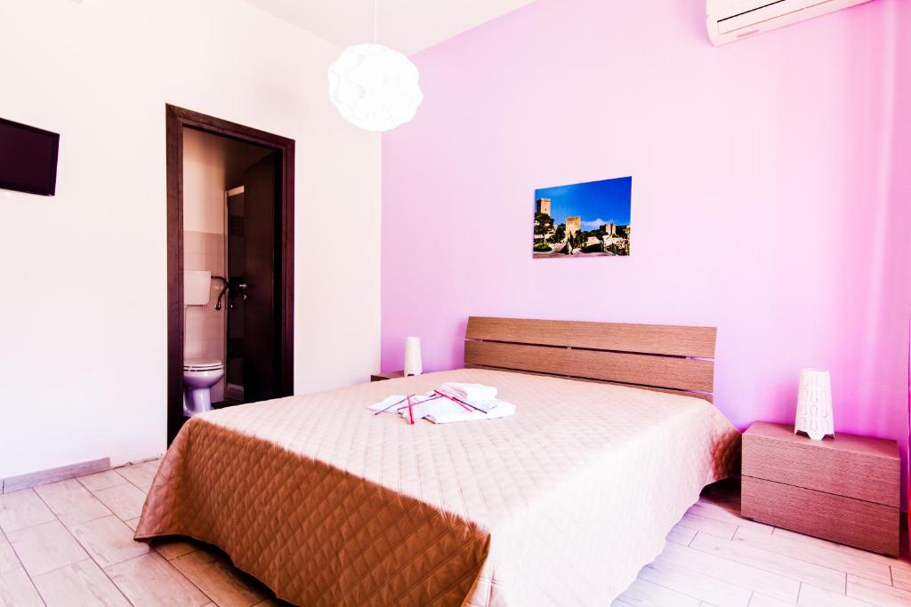 Postel nebo postele na pokoji v ubytování B&B A Mare