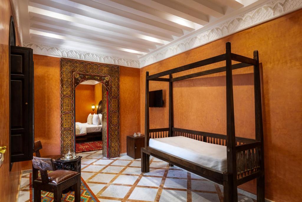 Postel nebo postele na pokoji v ubytování Alrashid Marrakech