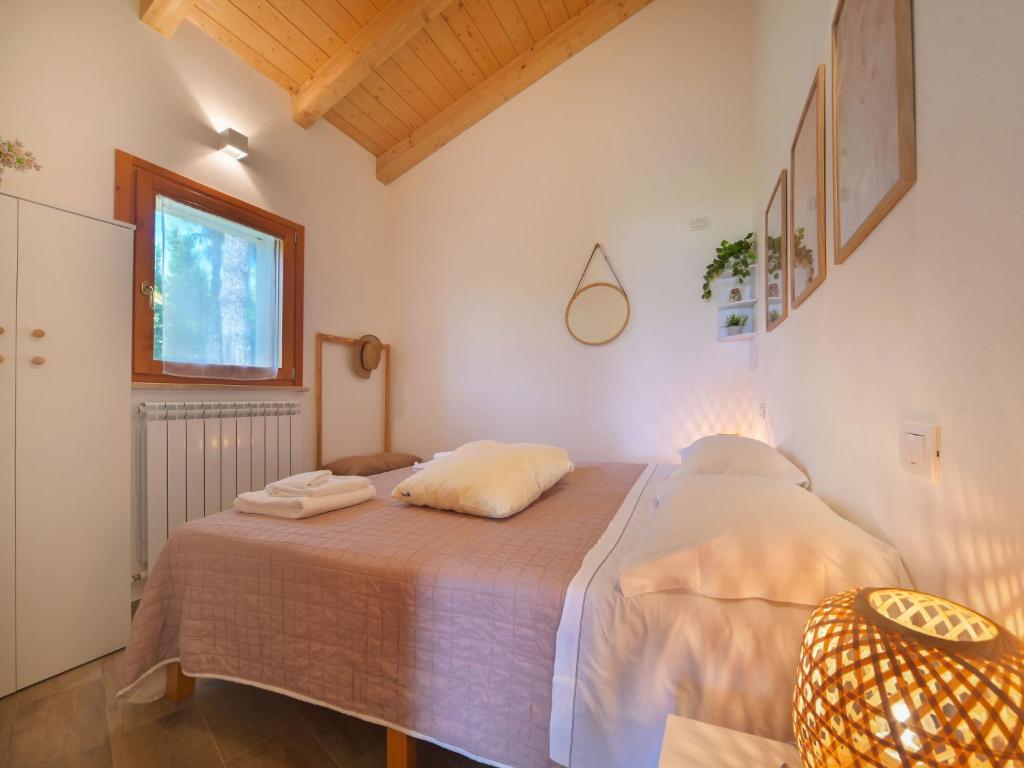 Postel nebo postele na pokoji v ubytování Chalet La Spiaggia by Interhome