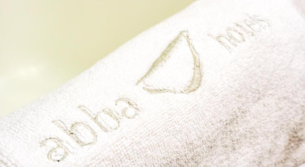 a close up of the back of a book with the word newbury at Abba Rambla Hotel in Barcelona