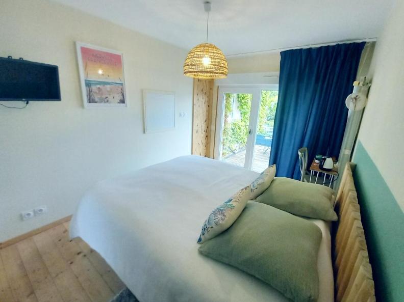 Postel nebo postele na pokoji v ubytování Chambres des marais