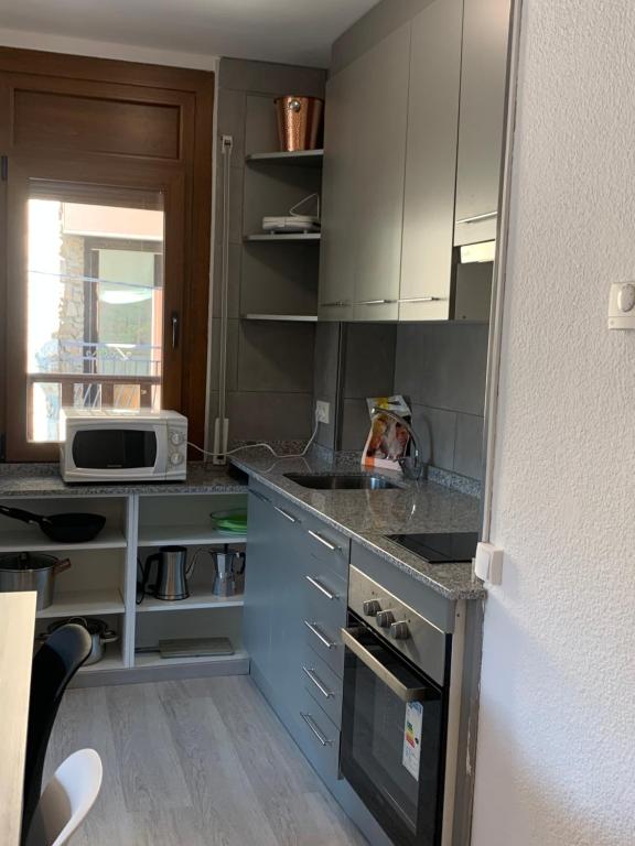 Kuchyň nebo kuchyňský kout v ubytování PASSAMANÉ 19 - Canillo - Casco Antiguo Hut 7867