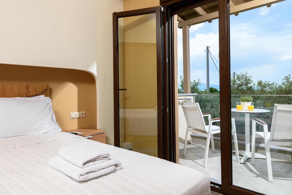 Postel nebo postele na pokoji v ubytování Olea Luxury Villa