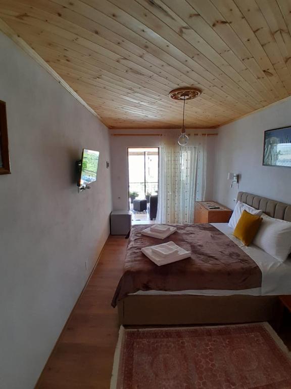 Postel nebo postele na pokoji v ubytování Guest House Ejona