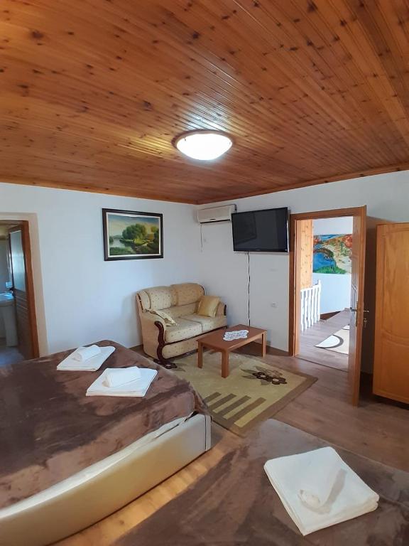 Posezení v ubytování Guest House Ejona