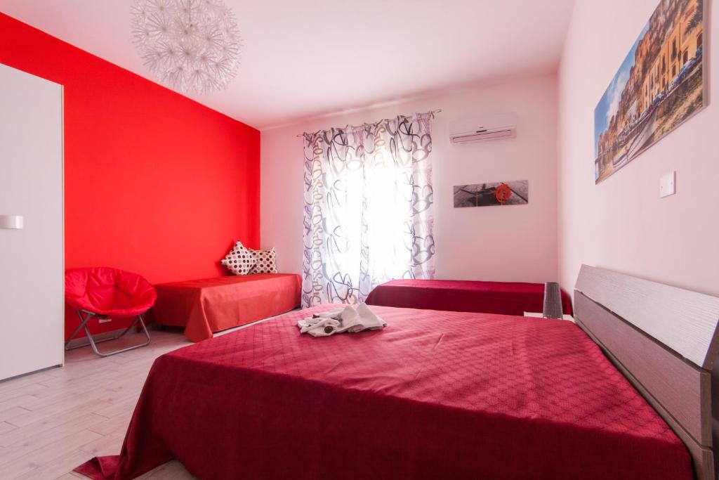 Postel nebo postele na pokoji v ubytování B&B A Mare