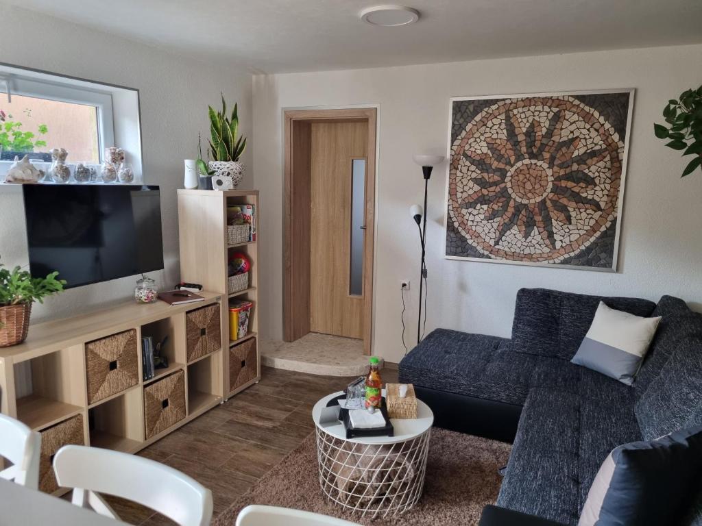 TV a/nebo společenská místnost v ubytování Apartmány 235 - 1