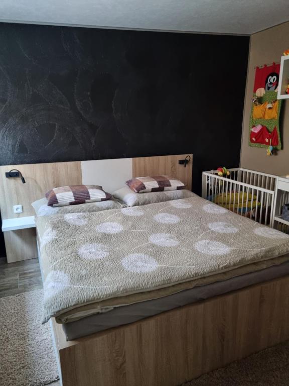 Postel nebo postele na pokoji v ubytování Apartmány 235 - 1
