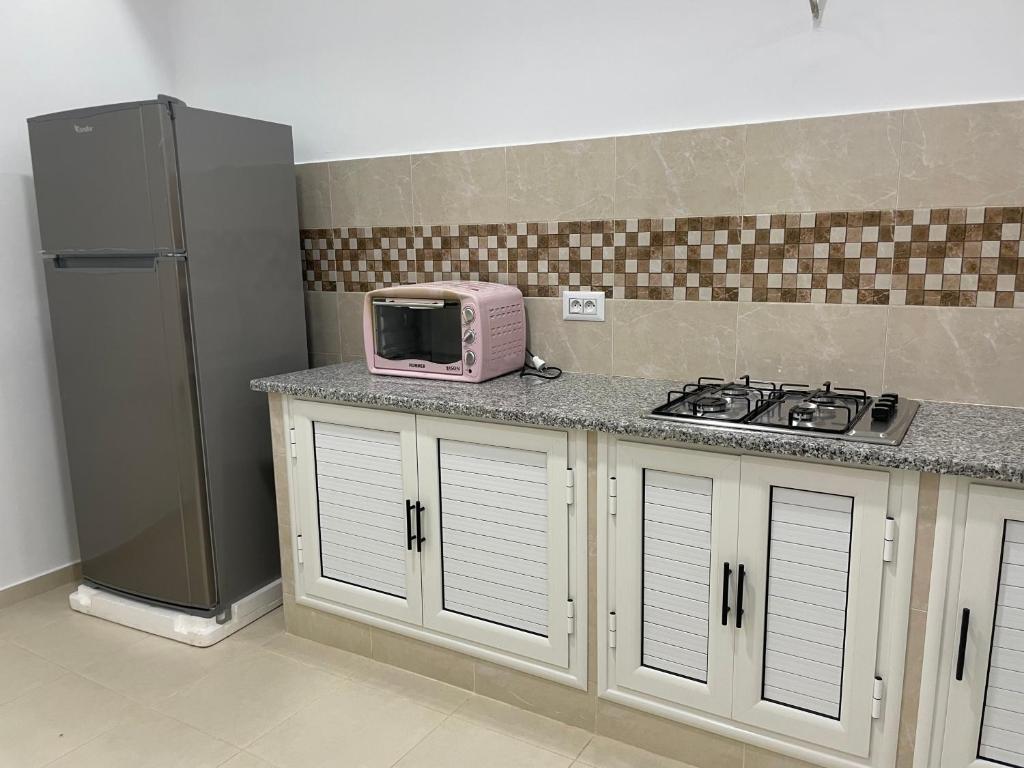 Kuchyň nebo kuchyňský kout v ubytování Ibrahim apartment