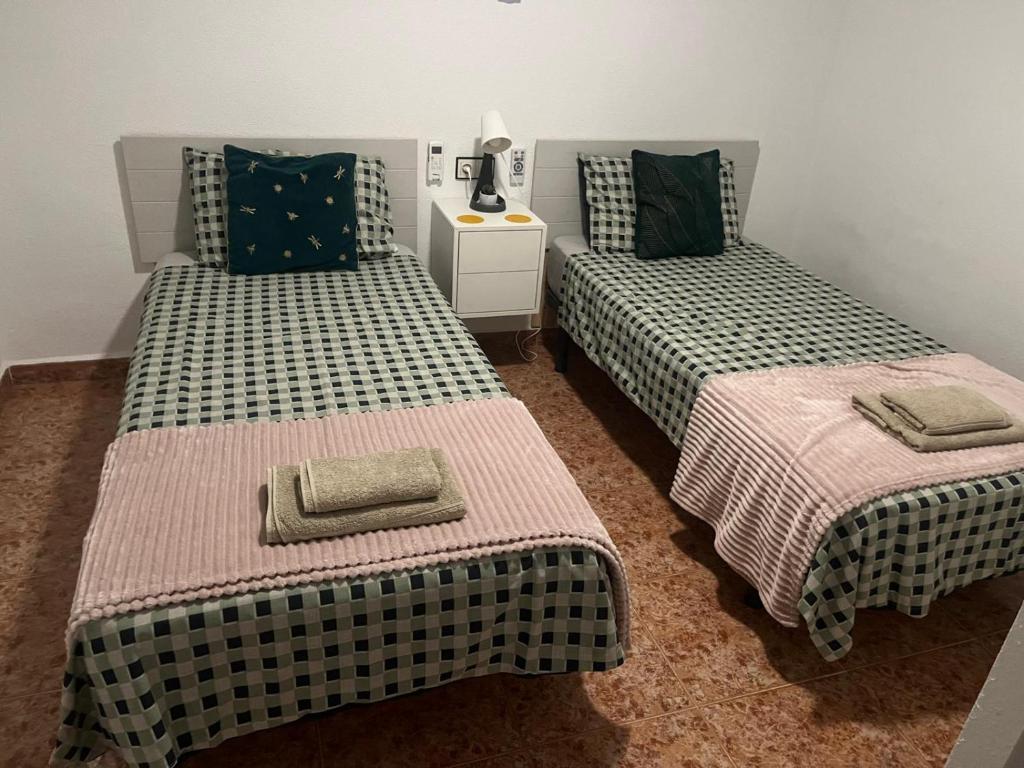 Postel nebo postele na pokoji v ubytování Casa Sol Vistabella Golf Resort