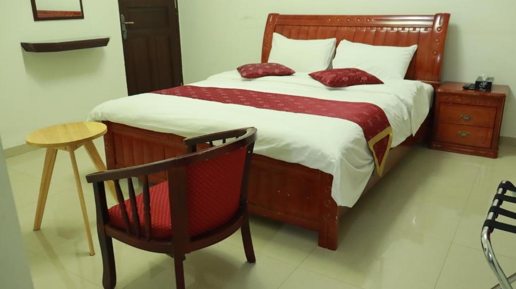 Postel nebo postele na pokoji v ubytování Bahla Hotel Apartments