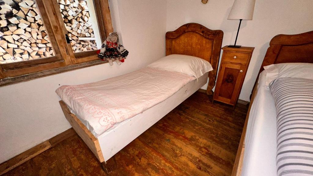 Postel nebo postele na pokoji v ubytování Chaloupka na Zelnicách Ratíškovice