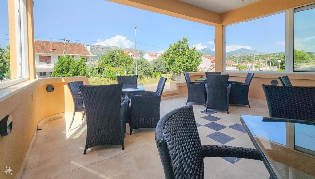 Balkón nebo terasa v ubytování Mali Hotel BaMBiS