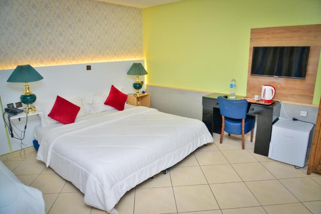 Postel nebo postele na pokoji v ubytování Free Zone Hotel