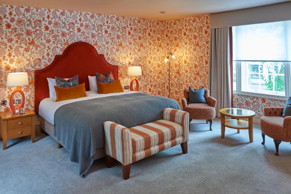 a hotel room with a bed and a chair at Hotel Du Vin & Bistro York in York