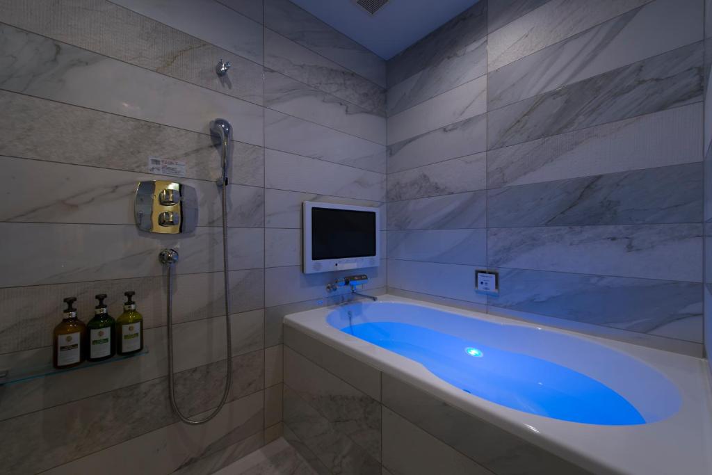 Koupelna v ubytování HOTEL GLANZ CASCATA