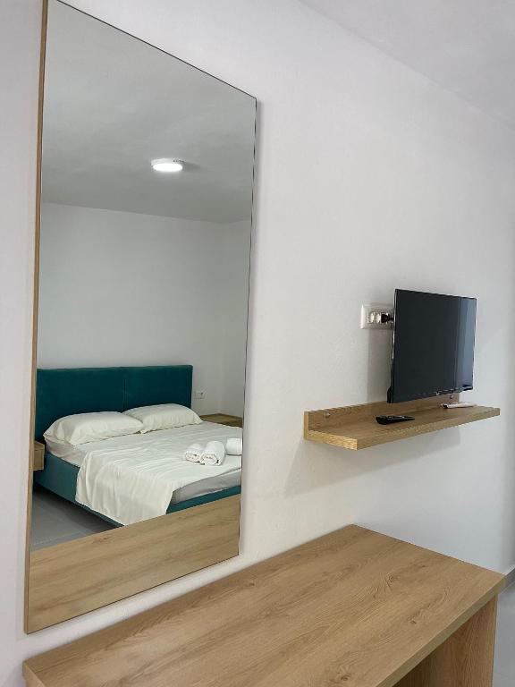 Postel nebo postele na pokoji v ubytování Kloi Luxe Appart-Hotel