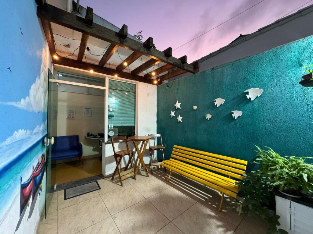 Khu vực ghế ngồi tại Pousada Vila Praiana