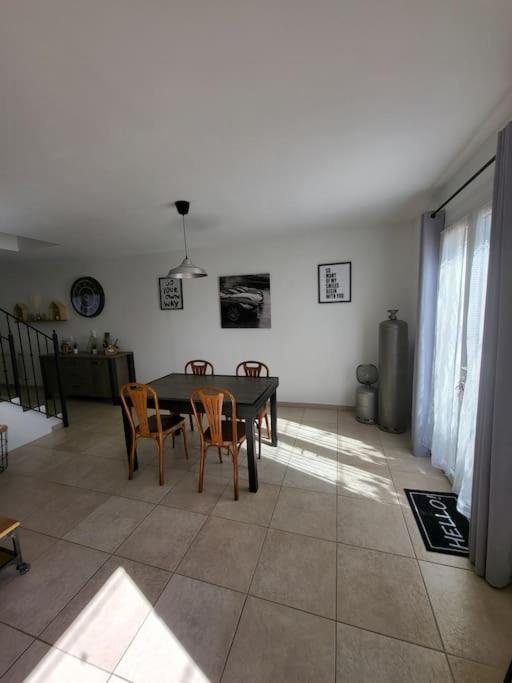 Posezení v ubytování Maison chaleureuse
