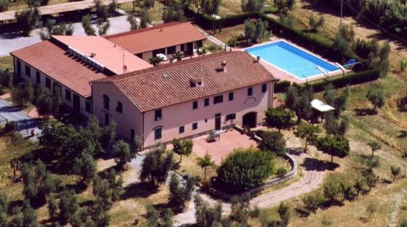 an aerial view of a large house with a swimming pool at Agriturismo La Torricella in Pistoia
