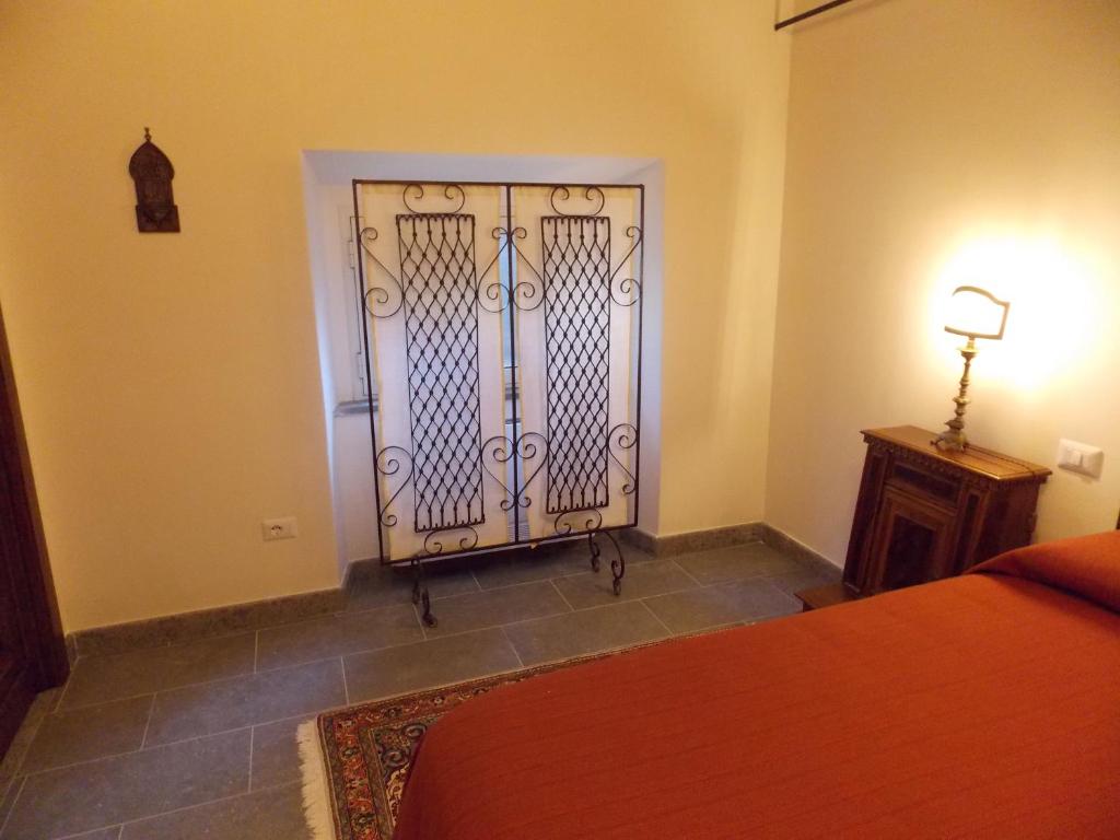 Postel nebo postele na pokoji v ubytování Il Rifugio del Vescovo