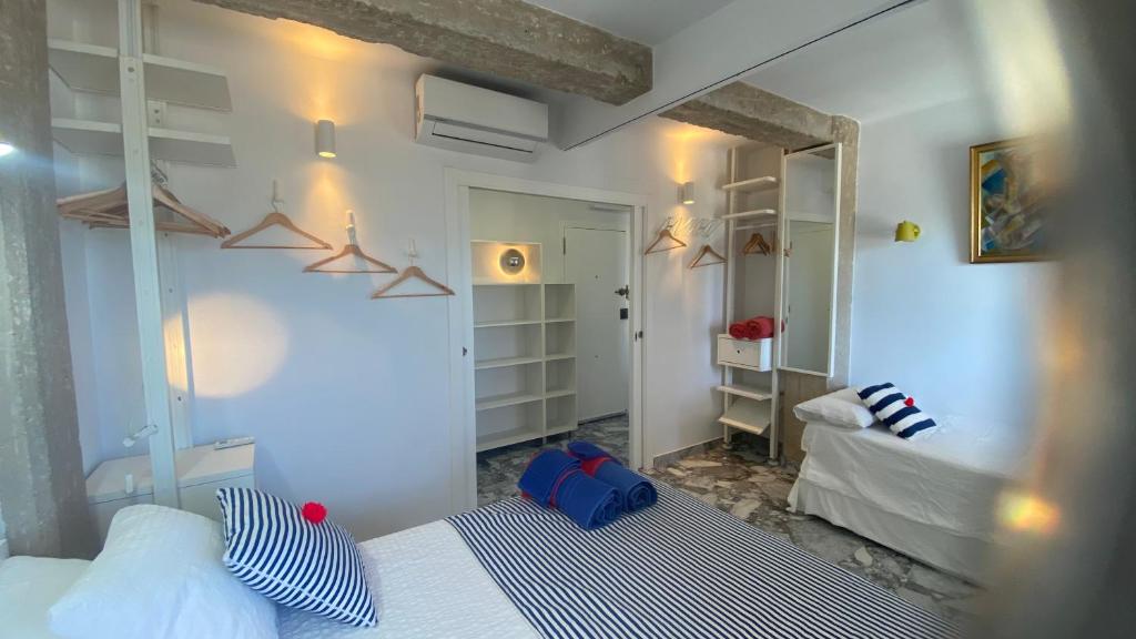 Postel nebo postele na pokoji v ubytování Apartamento centro de Dénia 1ra linea, vistas puerto y mar