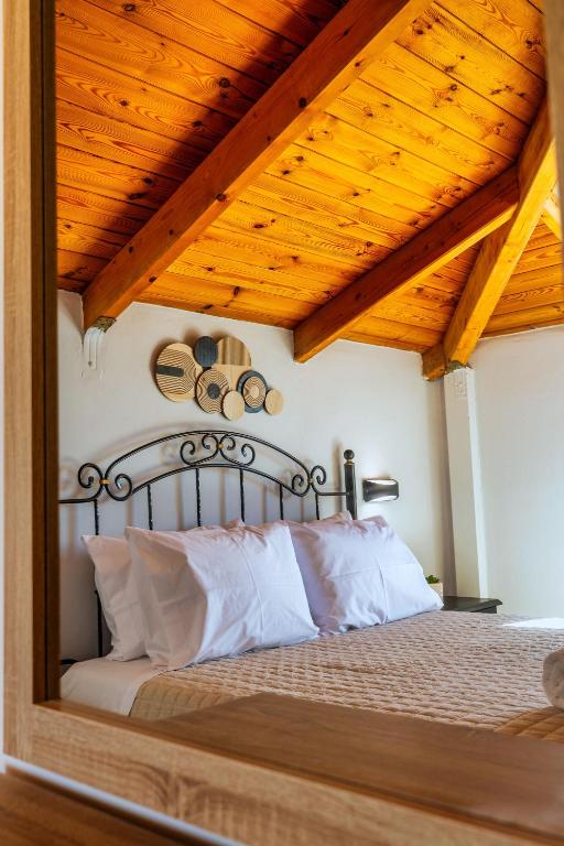Postel nebo postele na pokoji v ubytování Ionian Serenity House