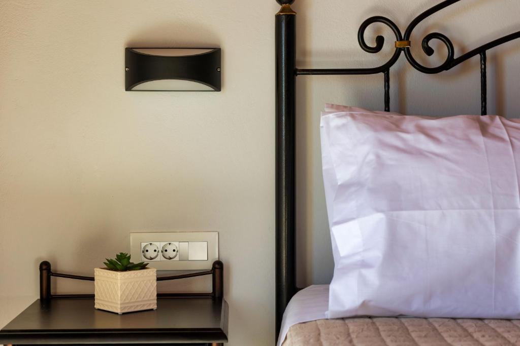 Postel nebo postele na pokoji v ubytování Ionian Serenity House