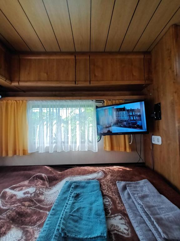 TV a/nebo společenská místnost v ubytování Schlafplatz für Radfahrer und Wanderer