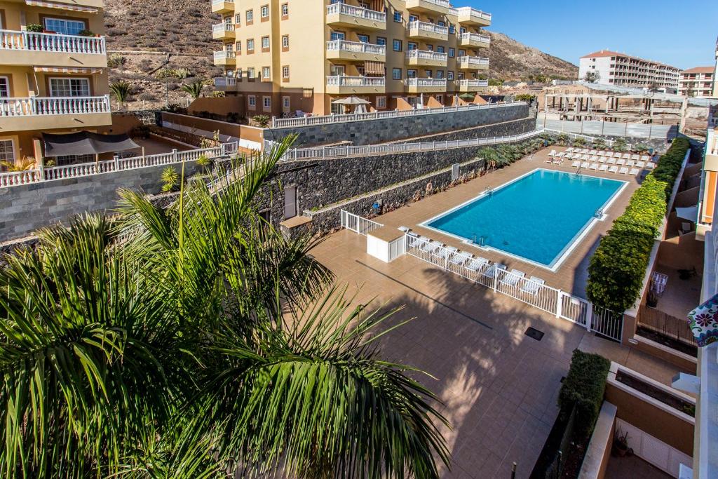 Bazén v ubytovaní Palm Duplex Penthouse alebo v jeho blízkosti