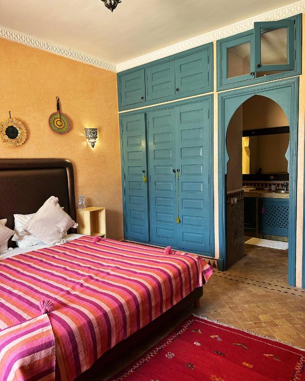 Postel nebo postele na pokoji v ubytování Palais Riad Berbère